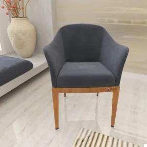 Old damaged chair restored with new upholstery fabric